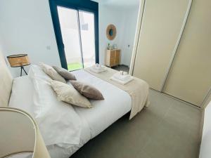 Posteľ alebo postele v izbe v ubytovaní Bonito Apartamento de 2 habitaciones con terraza