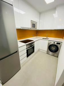 Kuchyňa alebo kuchynka v ubytovaní Bonito Apartamento de 2 habitaciones con terraza