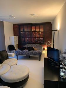 Posezení v ubytování Prachtige gastsuite in Ranst "Studio 34"