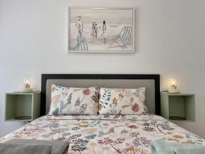 Łóżko lub łóżka w pokoju w obiekcie Casita del Puerto 2