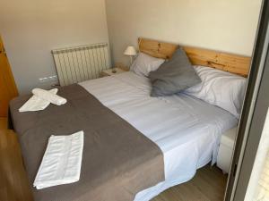 A bed or beds in a room at Dúplex 6 plazas para desconectar de la rutina