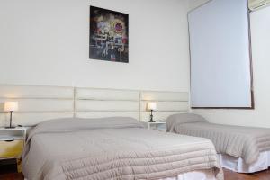 Katil atau katil-katil dalam bilik di Aparthouse Mendoza