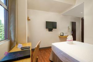 Μια τηλεόραση ή/και κέντρο ψυχαγωγίας στο MySpace Hotel @BGC