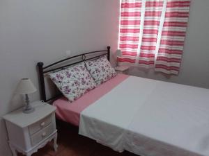 Postel nebo postele na pokoji v ubytování Τhalassa Home Fine Living