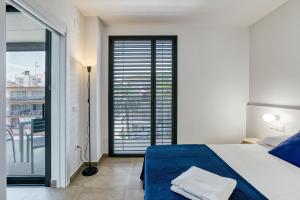 Postel nebo postele na pokoji v ubytování Pelosa Apartment