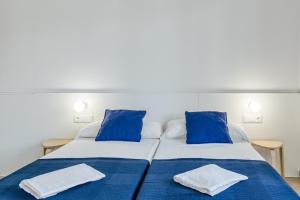 Postel nebo postele na pokoji v ubytování Pelosa Apartment