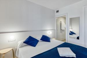 Postel nebo postele na pokoji v ubytování Pelosa Apartment