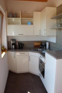 Kuhinja oz. manjša kuhinja v nastanitvi Apartment Westerhever