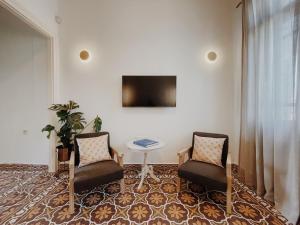 TV a/nebo společenská místnost v ubytování Kale Kapi City Living