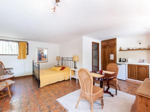 a living room with a bed and a table at Majestic Villa in Callas France with Private Pool in Callas