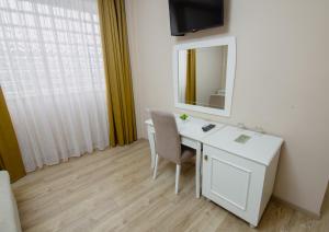 TV a/nebo společenská místnost v ubytování Christi's Hotel Borova