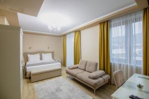 Postel nebo postele na pokoji v ubytování Christi's Hotel Borova