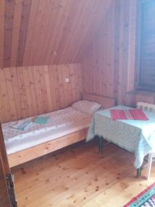Postel nebo postele na pokoji v ubytování Kolibri