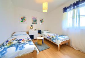 Postel nebo postele na pokoji v ubytování Apartments Aster