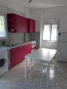 Kuchyňa alebo kuchynka v ubytovaní Falopa Apartments