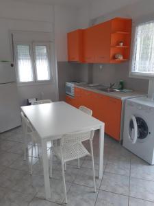 Kuchyňa alebo kuchynka v ubytovaní Falopa Apartments