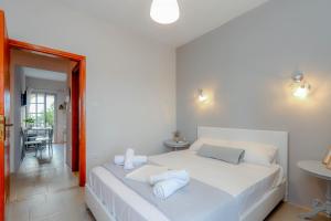 Posteľ alebo postele v izbe v ubytovaní Calma Luxury Apartments #2 Sozopoli in Halkidiki
