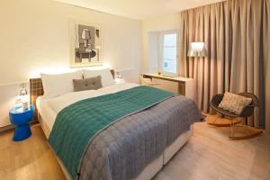 Postelja oz. postelje v sobi nastanitve Hotel Rössli