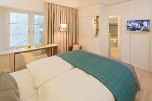Postelja oz. postelje v sobi nastanitve Hotel Rössli