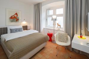 Postelja oz. postelje v sobi nastanitve Hotel Rössli