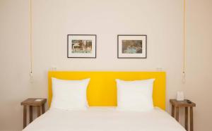 Voodi või voodid majutusasutuse Vesper Hotel toas