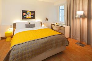 Postelja oz. postelje v sobi nastanitve Hotel Rössli
