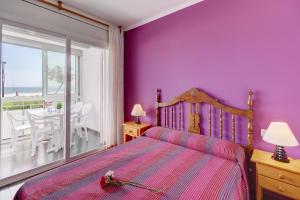 En eller flere senger på et rom på Residence de la Plage Roses - Immo Barneda