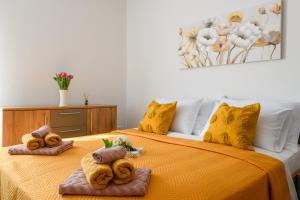 Posteľ alebo postele v izbe v ubytovaní Cosy apartment Klara