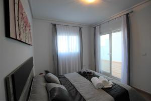 Postel nebo postele na pokoji v ubytování Adosado Roldán by Rental Olé