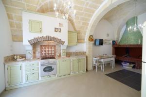 Kuchyň nebo kuchyňský kout v ubytování Holiday Home La Leccina