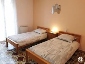 Кровать или кровати в номере La Paraguere