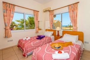 Postel nebo postele na pokoji v ubytování Villa Magnolia by Villa Plus + 19 fotografií