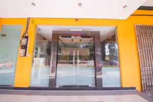 an entrance to a building with an open door at Golden Pearl Hotel Near Universiti Tun Hussein Onn Malaysia UTHM in Batu Pahat