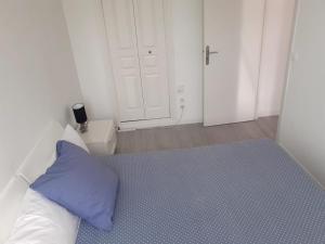 Cama ou camas em um quarto em Bel appartement pour vos séjours sur la côte