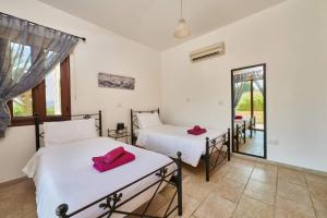 Postel nebo postele na pokoji v ubytování Villa Andriana by Villa Plus