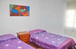 Postel nebo postele na pokoji v ubytování Apartamento Santa María II