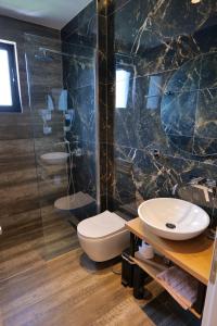 Een badkamer bij Hotel Alexander