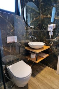 Een badkamer bij Hotel Alexander