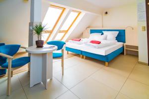 Postel nebo postele na pokoji v ubytování Paula Wellness & SPA