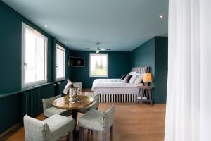 Postel nebo postele na pokoji v ubytování Seeloft - a Sharp Hotel