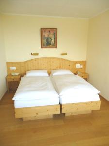 Postel nebo postele na pokoji v ubytování Grand Hôtel du Parc