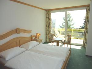 Cama o camas de una habitación en Grand Hôtel du Parc