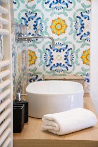 Phòng tắm tại Castalia Apartments & Rooms Duomo Taormina