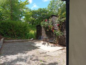 Zahrada ubytování Sea view 1-Bed Cottage with private garden