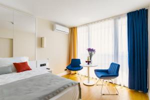 Voodi või voodid majutusasutuse G-Point City Beach toas