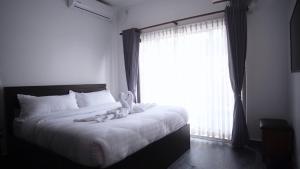 Katil atau katil-katil dalam bilik di NS Villa
