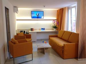 Зона вітальні в Hotel Tamaro