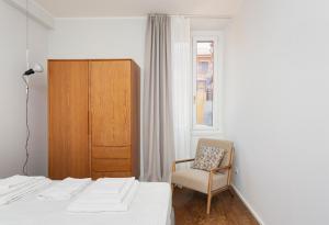 Posteľ alebo postele v izbe v ubytovaní Design Interior Apt China Town Piazzale Baiamonti