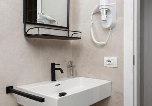 Kúpeľňa v ubytovaní Design Interior Apt China Town Piazzale Baiamonti + 7 fotografií
