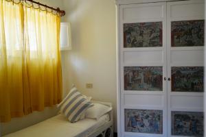 เตียงในห้องที่ Two bedrooms Capri style home near Piazzetta